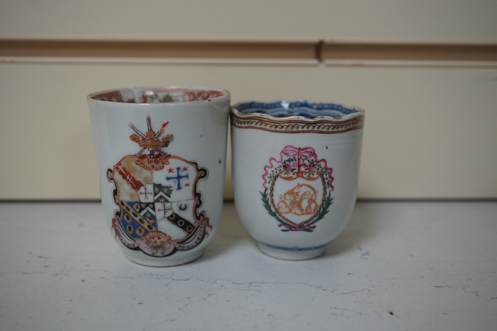 Six assorted 18th century Chinese export coffee cups with armorial decoration, and a similar European subject cup and saucer. Condition - damaged/restored